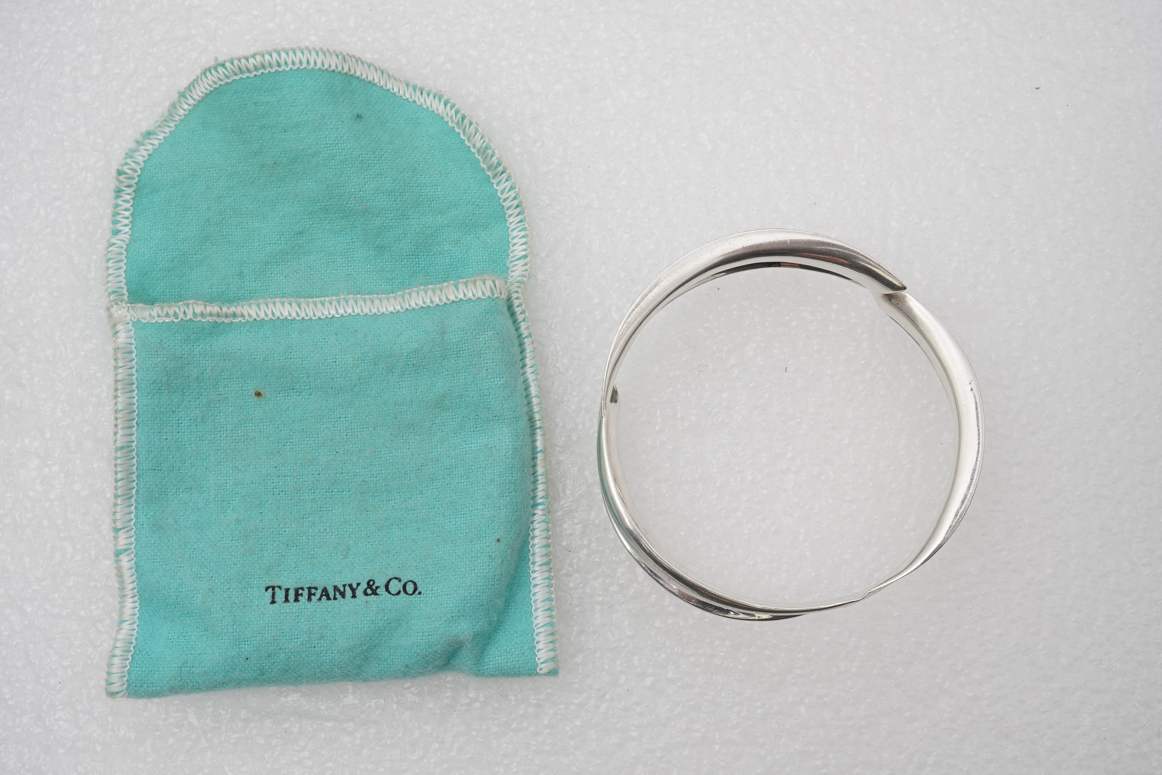 Frank Gehry for Tiffany & Co., a silver 'Fish' bangle, circa 2008